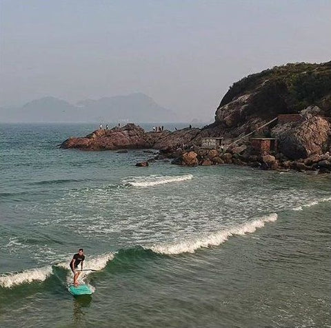 SUP surfing on a Cruiser SUP stand up paddle board