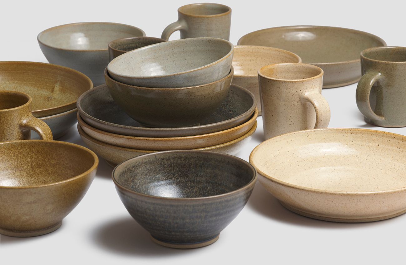 Selection of Pottery West stoneware bowls and mugs 