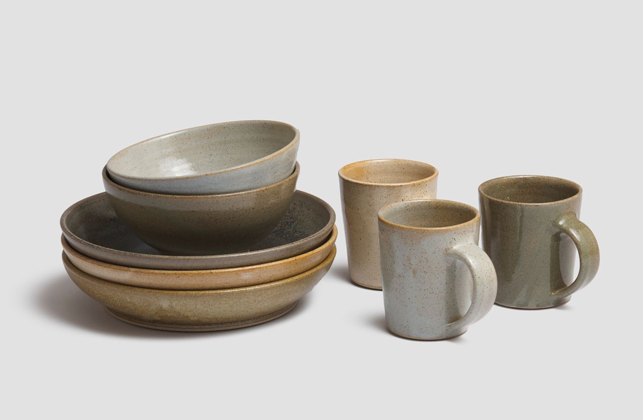 Selection of Pottery West stoneware ceramic bowls and mugs