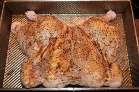 Butterflied whole chicken with Roast Chicken Seasoning.