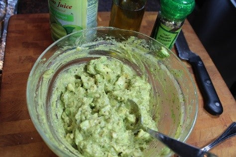 Guacamole mixed with ingredients