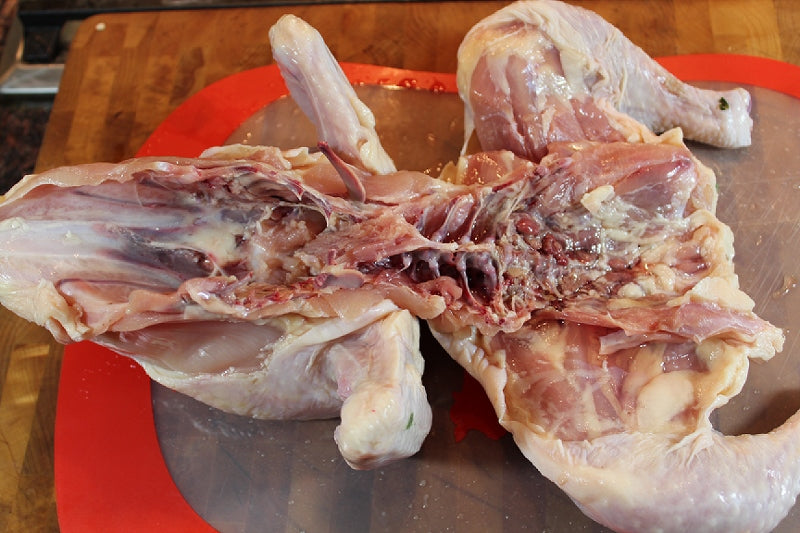 Cut through the rib bones down to the neck bone on both sides.