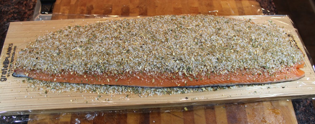 Spread the remaining salt/sugar/herb mix evenly on the salmon