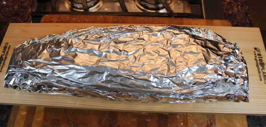 Salmon wrap with plastic wrap and then foil.