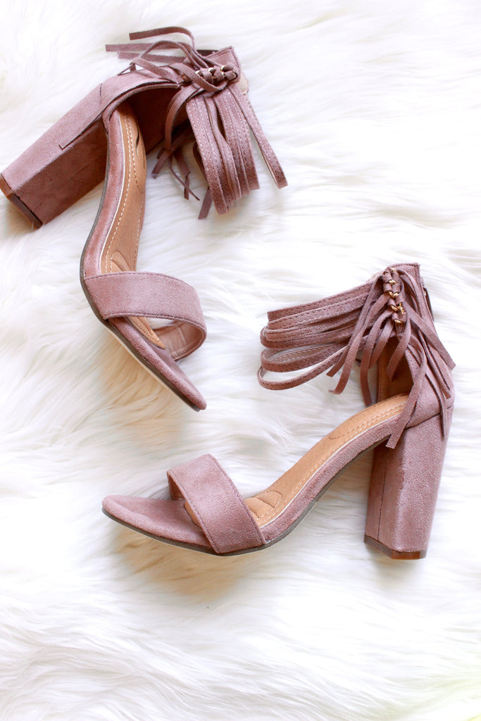 heels with fringe on them