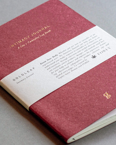 Red Cannabis Intimacy Journal with a white band by Goldleaf