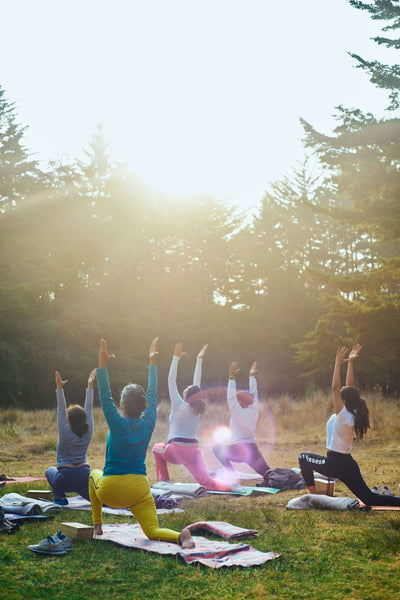 A group of woman doing yoga together