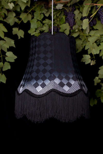 Meet the Maker Willemiek Upcycles Thrift Shop Bell Lampshade Frames  - See more at www.ilikethatlamp.com