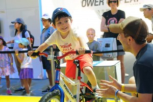 boy on ecocharger at the pan am games