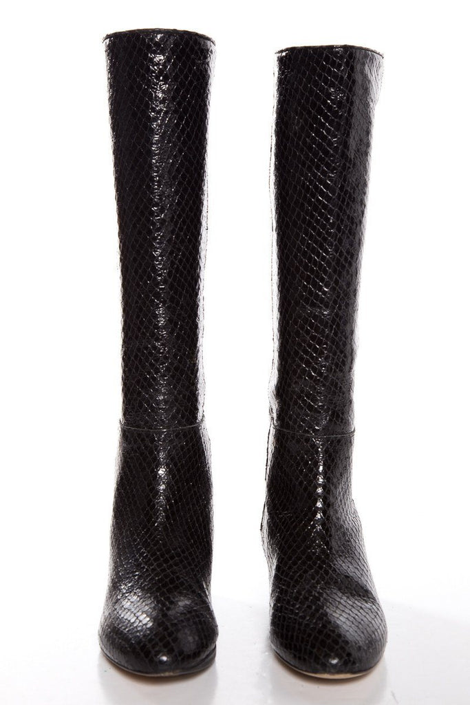 snakeskin wedge boots