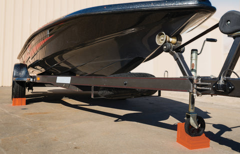 Front of a boat being secured by the Lynx Chock 'R Dock