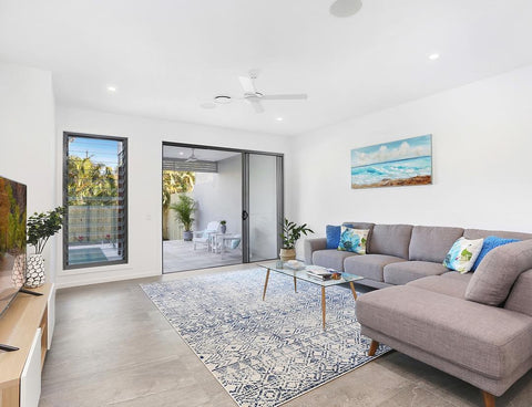 Blue rug open living room