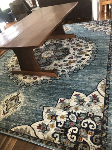 Blue rug wooden coffee table