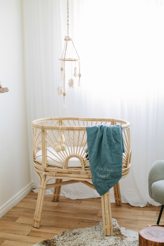 boys nursery, rattan crib, rattan cot, boys boho nursery , blue linen baby blanket 