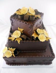 Gold Roses On Chocolate Premier Wedding Cake Tiffany S Bakery