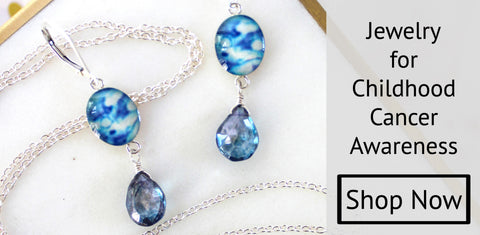 sterling silver earrings with blue quartz and resin that give back to childhood cancer 