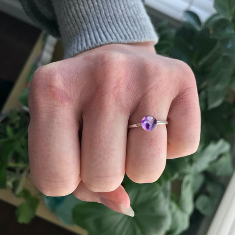 fist wearing the forget me not ring for lupus awareness and research