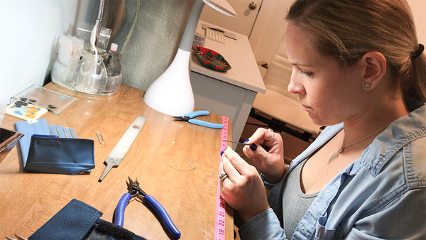 nikki filing at her work bench