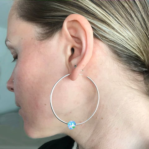 Nikki wearing the power hoop earrings for Alzheimer's awareness