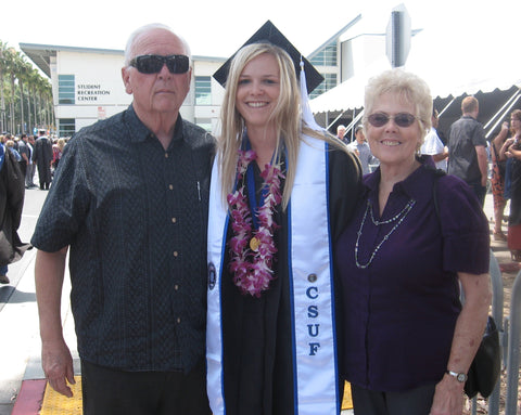 Nikki with Grandpa Mike and Grandma Carolyn at College Graduation