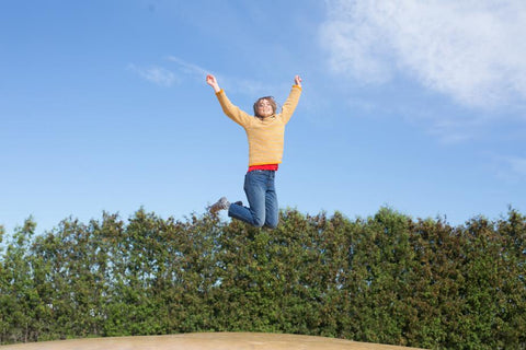 happy woman jumping