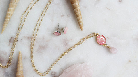 Pink and gold breast cancer legacy necklace that gives back