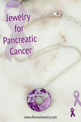 purple jewelry for pancreatic cancer awareness gives back to charity and research.