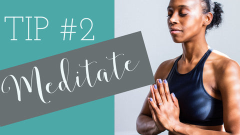 woman clasping hands in prayer pose during meditation tip #2 meditate