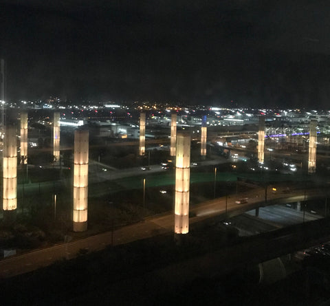 Iconic Gateway Pylons at LAX lit yellow