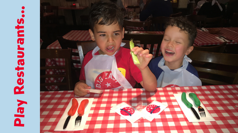 young boys playing restaurants