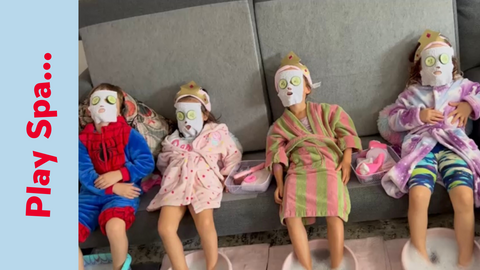 young children role playing spa