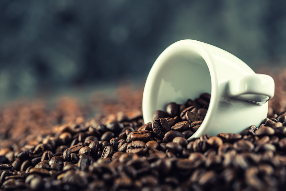 a cup with coffee beans