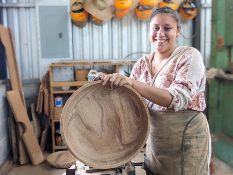 Jasmine making a bowl at the Mission Lazarus carpentry shop in Honduras