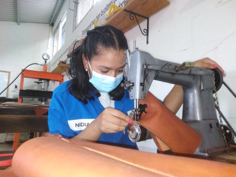 Nidia working in the leather production studio