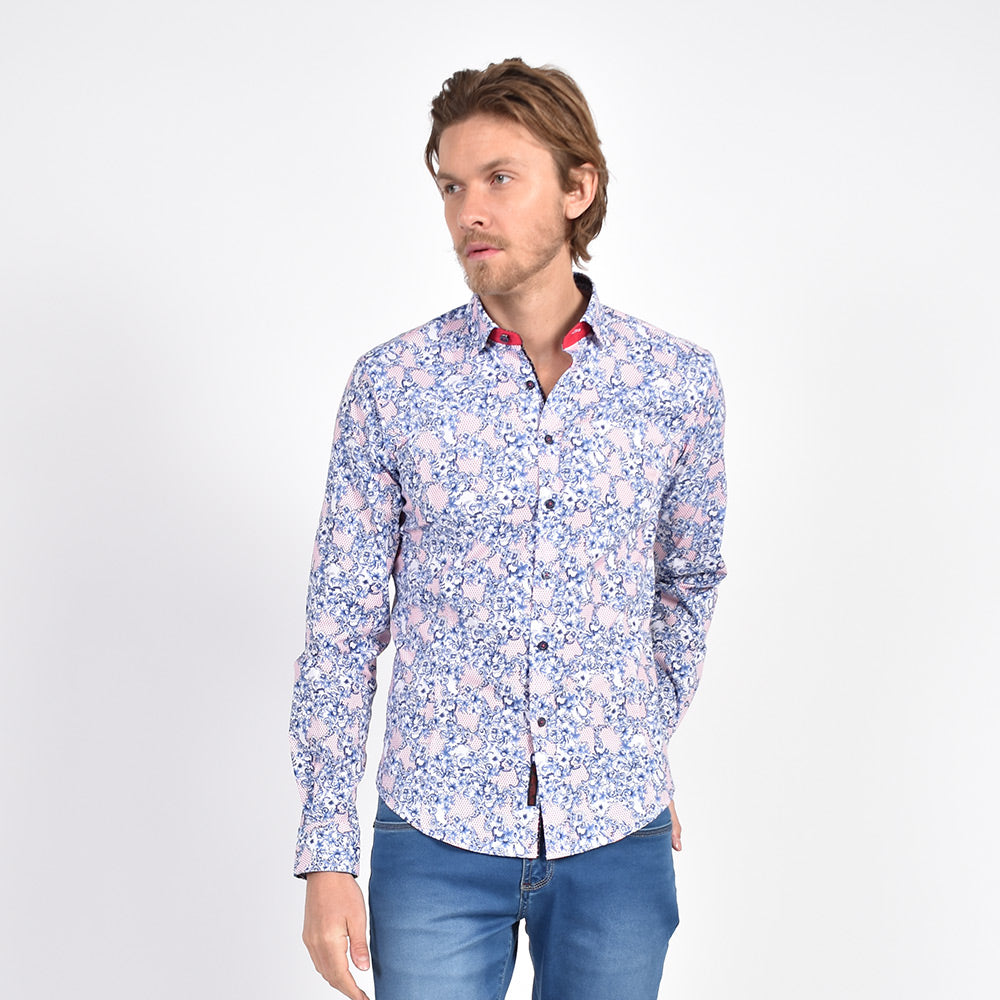 Model in navy and red baroque floral button-up.