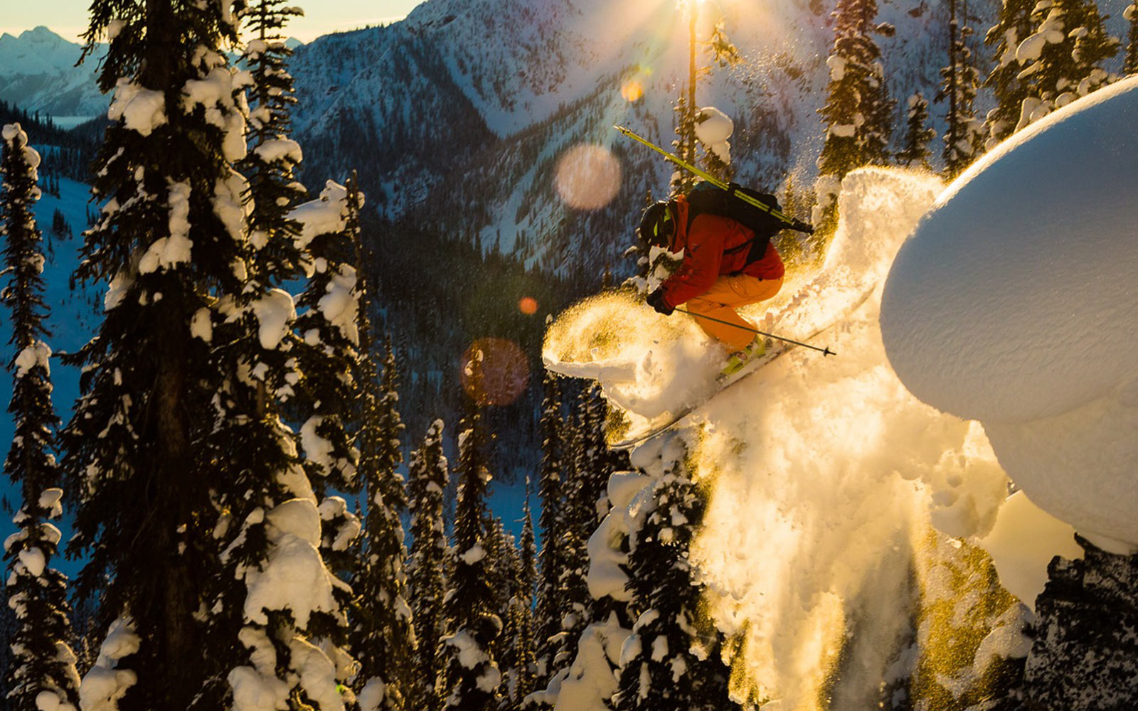 skier hucking off a cornice