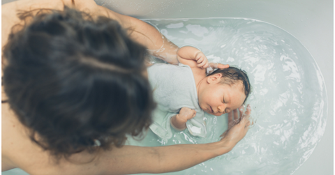 Baby having a bath