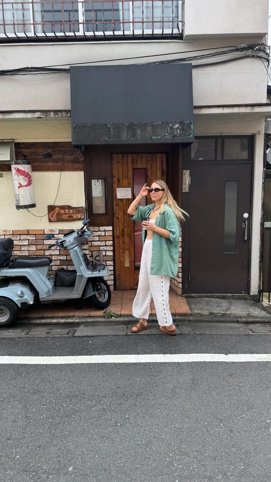 Our beautiful founder, Kel, in the Streets of Japan wearing our Grateful Heart Shirt and Feeling Light Pant 