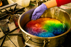 Dye pot with multi-colored dyed yarn