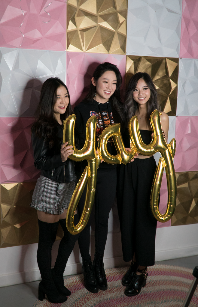 Megan Lee, Jasmine Cho, and Michelle Truong taking pics infront of our boomerang area!