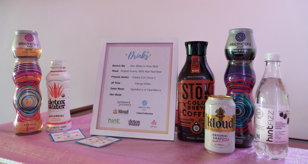 Drinks area. Sponsored by electric sky wine, detox water, kloud, pressed juicery, hint, and up time! 