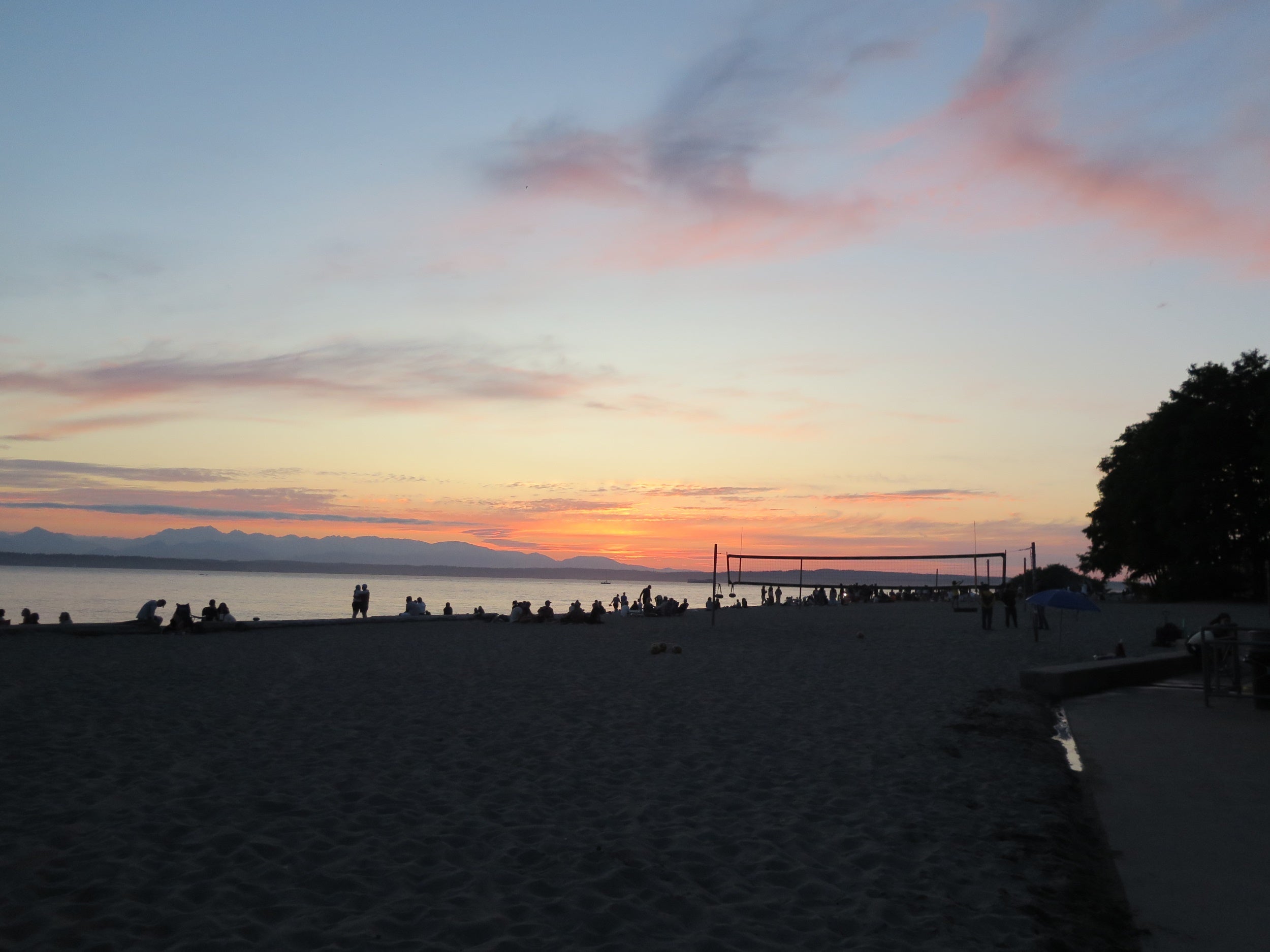 Image of a sunset at Golden Gardens Beach in Seattle.