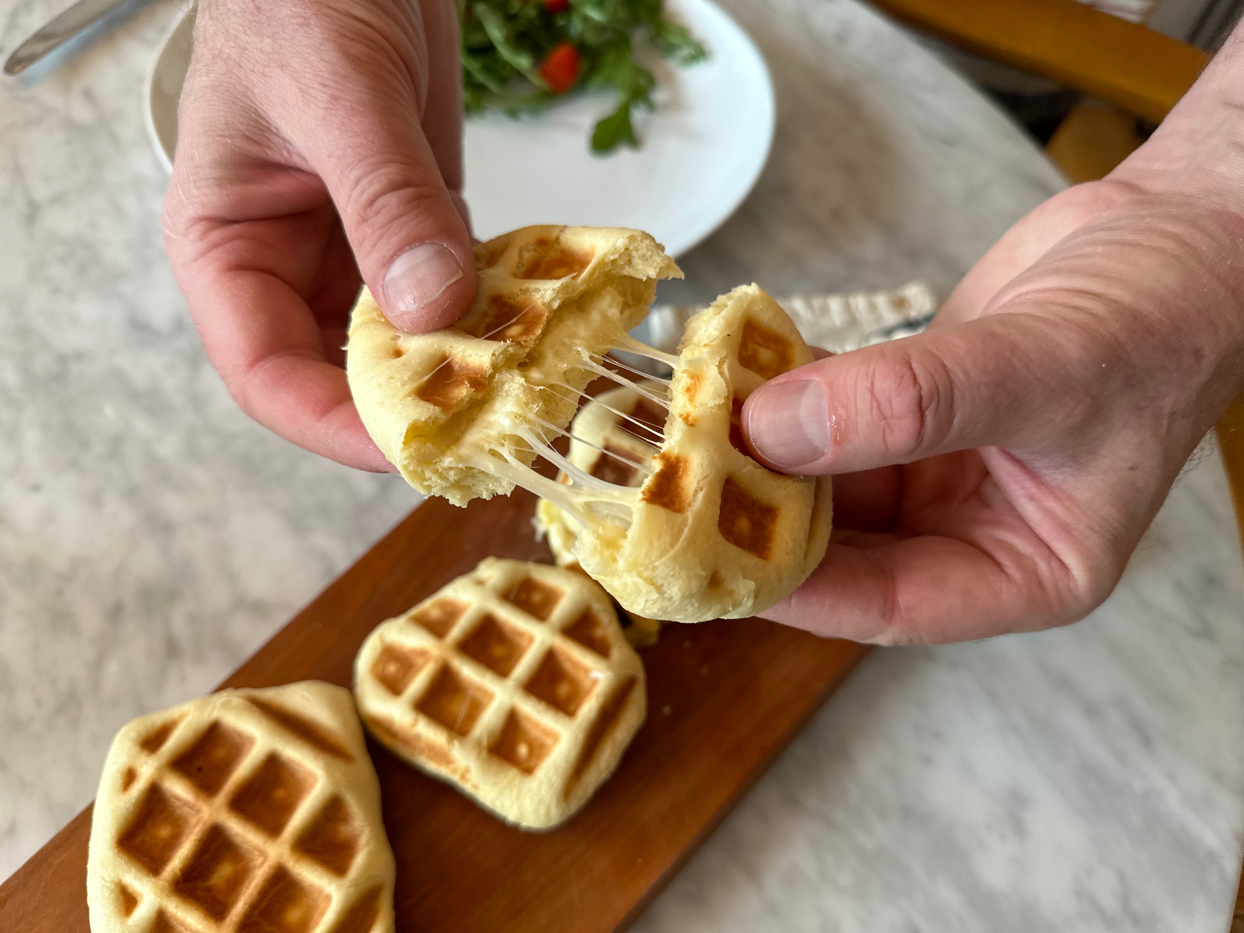 Cheesy waffles stuffed with raclette cheese