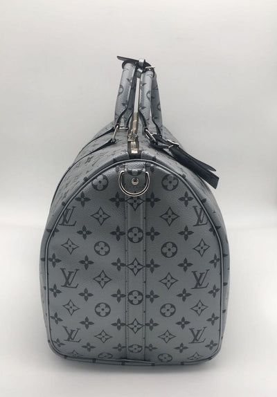 Louis Vuitton | Keepall Bandouliere 50 Metallic Silver | M43848– The-Collectory