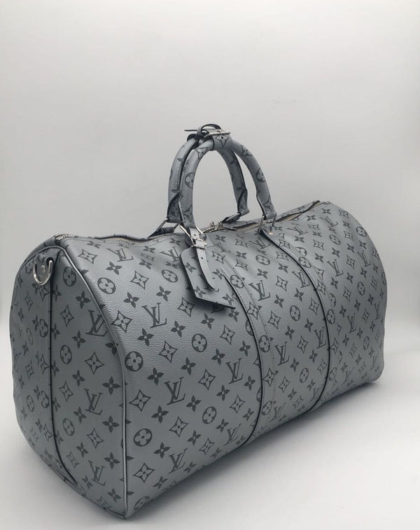 Louis Vuitton | Keepall Bandouliere 50 Metallic Silver | M43848– The-Collectory
