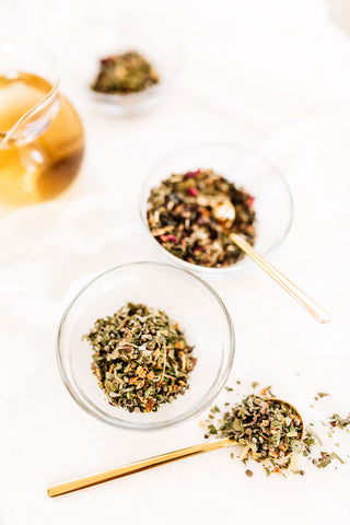 Loose leaf organic tea with gold spoon