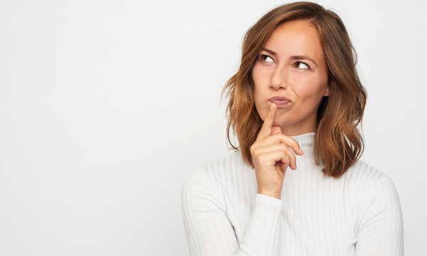 Woman thinking about menstrual cup