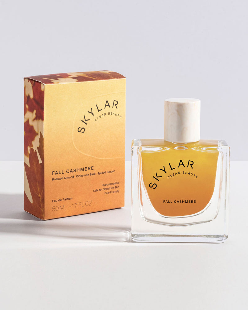 Skylar Fall Cashmere fragrance: Full-size bottle with a warm spicy scent next to packaging box.