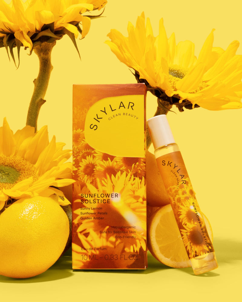 Sunflower Solstice fragrance: Travel-size bottle with a floral citrus scent by sunflowers and lemon.