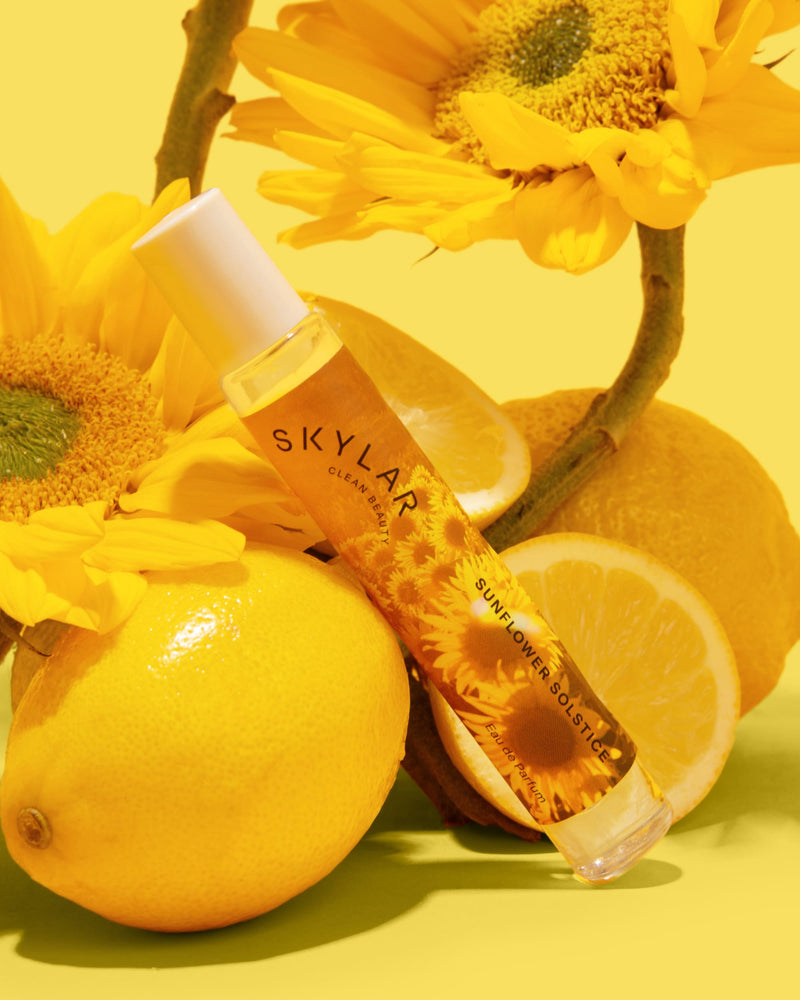 Sunflower Solstice fragrance: Travel-size bottle with a floral citrus scent by sunflowers and lemon.